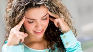 A woman looking stressed